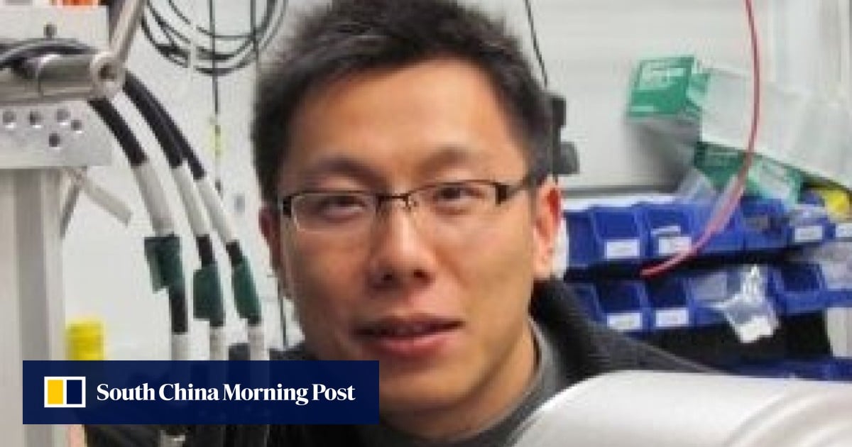 Portrait of scientist Hongjin Tan in a laboratory setting